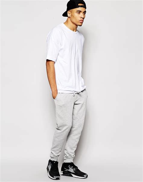 Lyst Asos Skinny Joggers With Zip Fly And Button Detail In Gray For Men