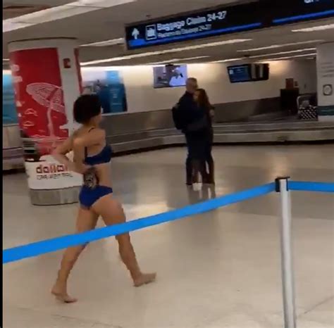 Barely Dressed Woman Meanders Through Security At The Miami Airport