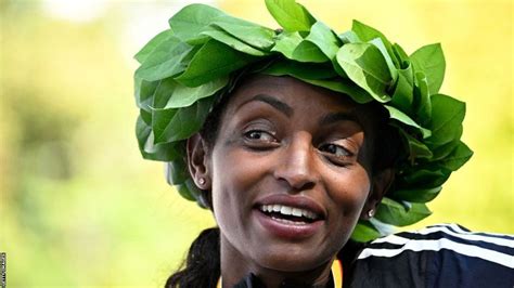 marathon record breaker tigst assefa her coach and experts on historic run bbc sport