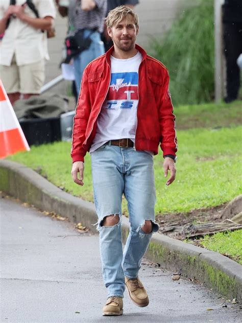 Ryan Gosling Is Melting Hearts In A Red Track Jacket And Ripped Jeans On The Fall Guy Set