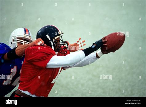 Football Players In Action Stock Photo Alamy