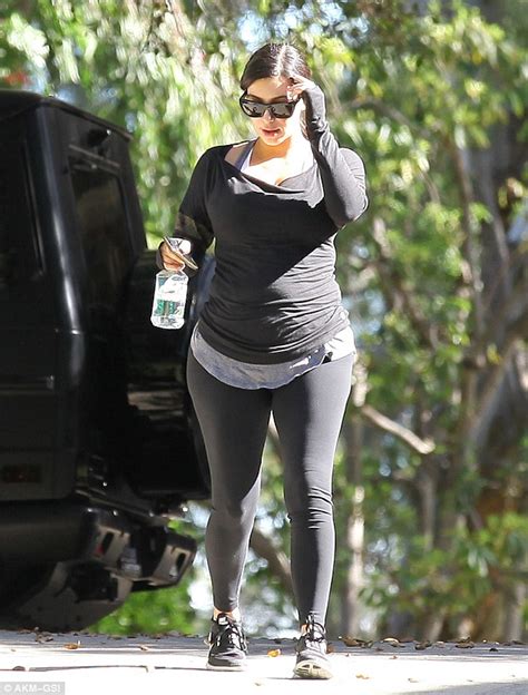 Kim Kardashian Shows Off Her Growing Baby Bump As She Keeps Comfortable