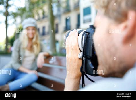 Photographer Photographing Fashion Model In Street Stock Photo Alamy