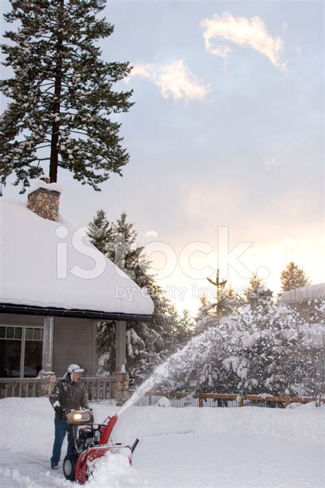 Snow Blowing Driveway Stock Photo Royalty Free Freeimages