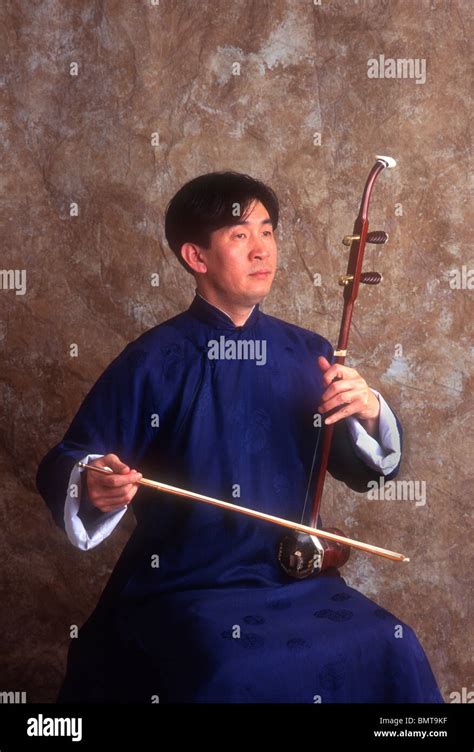 Chinese Musician Playing Erhu Stock Photo Alamy