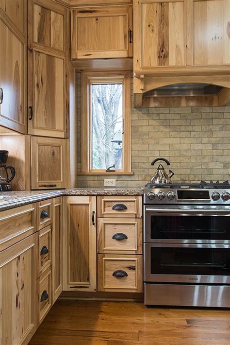 Earthy Tones Of The Rustic Hickory Cabinets Brown Brick Backsplash