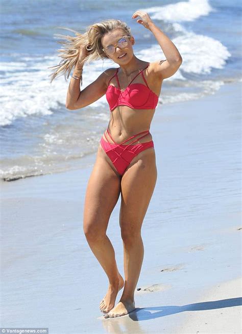 Tallia Storm Flaunts Her Toned Abs In A Striking Red Bikini In Spain Daily Mail Online
