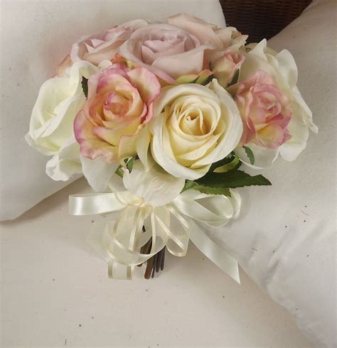 A Wedding Bouquet Of Artificial Silk Vintage Pink And Ivory Rose