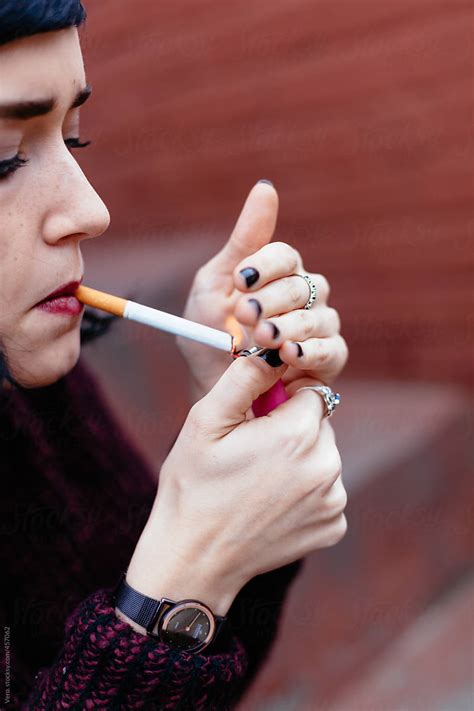 Woman Smoking A Cigarette By Stocksy Contributor Vero Stocksy