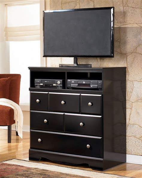 Give your home a shot of style with our living room furniture. 40" Contemporary Media Chest in Black | Mathis Brothers ...