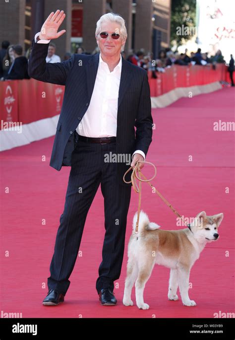 Richard Gere And The Dog From The Film A Dogs Story Arrive On The