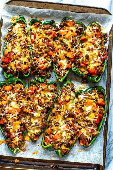 The filling is essentially sauteed garlic, shredded chicken, diced tomatoes, and taco seasoning. Low Carb Stuffed Poblano Peppers - The Girl on Bloor ...