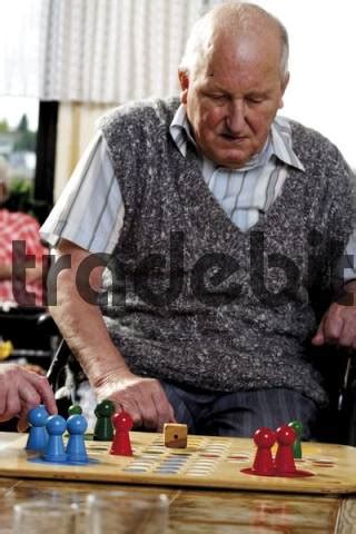 We did not find results for: Senior citizen playing a board game in an old-age home - Download P...