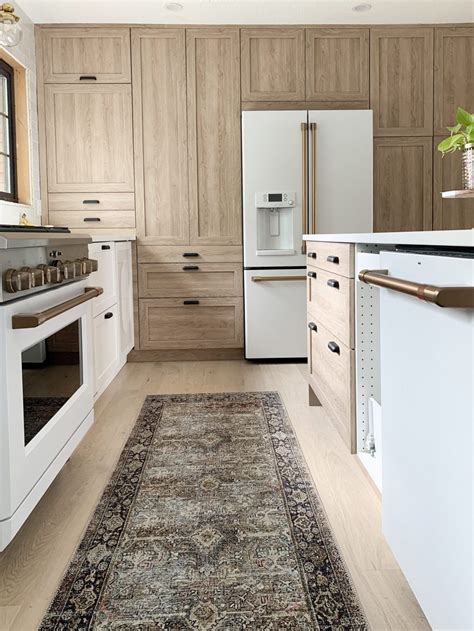 However, with white cabinets, the green color on the fridge will be the talk of the entire house. The White and Brush Bronze Cafe Appliances that have my whole heart in the Fullmer Kitchen ...