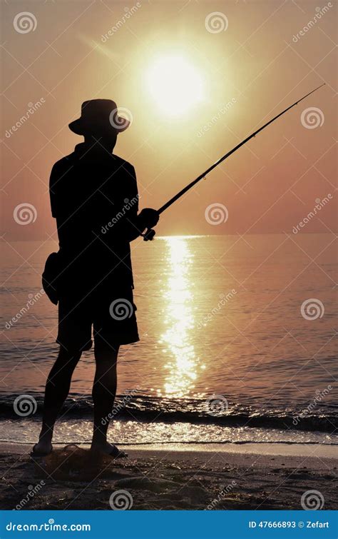 Fisherman Silhouette On The Beach At Sunset Stock Image Image Of