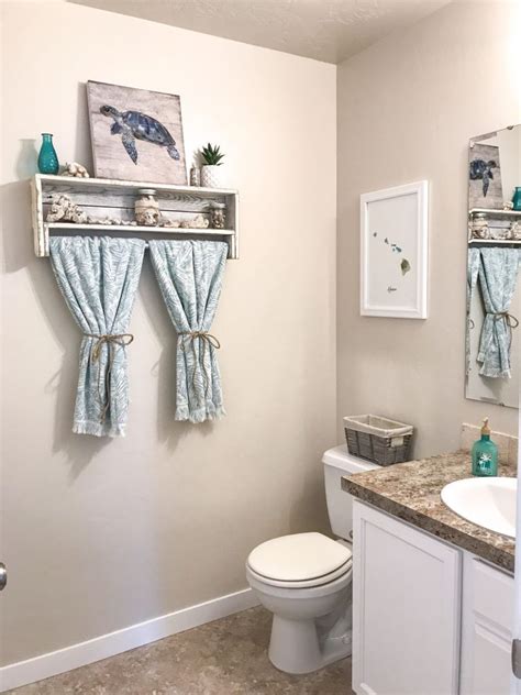 You know those ugly plastic caps that hide the bolts holding your toilet to the floor? Beach Themed Bathroom Decor Ideas | How We Do in 2020 ...