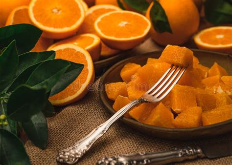 Slices Of Oranges On A Plate Stock Photo Image Of Background