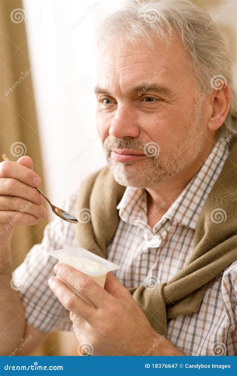 Senior Mature Man Eat Yogurt Snack Stock Image Image Of Leisure Grey 18376647