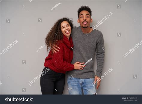 Lovely Young Cheerful Dark Skinned Couple Stock Photo 1589871073