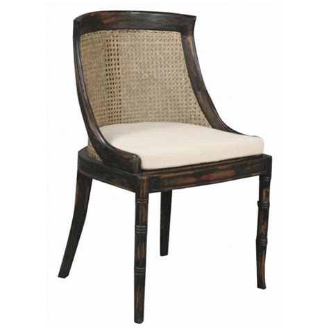 Shifflett rocking chair with cushions. Samuel Caned Dining Chair