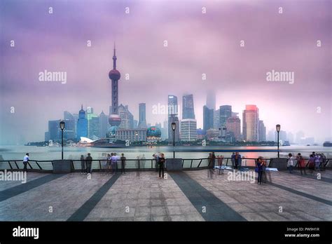 China Shanghai Pudong Cbd Sunset View Over River Illuminated