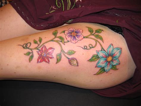 Beautiful Design Flowers Thigh Tattoo