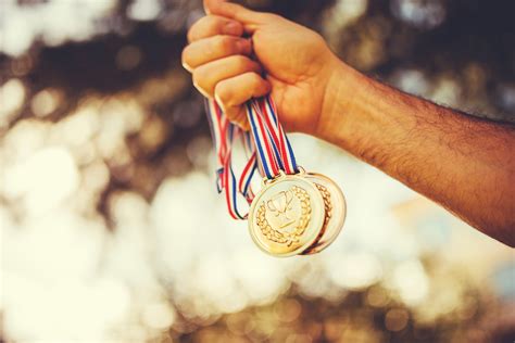In the softball tournament, which got under way earlier in the week before the official opening ceremony, the gold medal favourites continued their winning start, beating mexico. When is a Gold Medal Not a Gold Medal? - Analyzing Metals