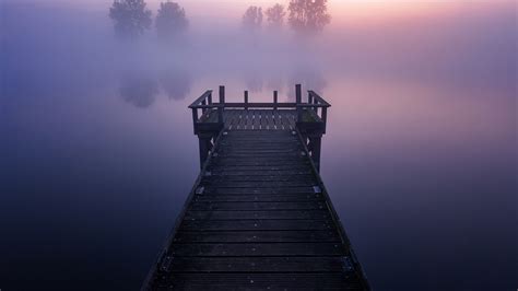 2560x1440 Resolution Pier And Foggy Lake 1440p Resolution Wallpaper