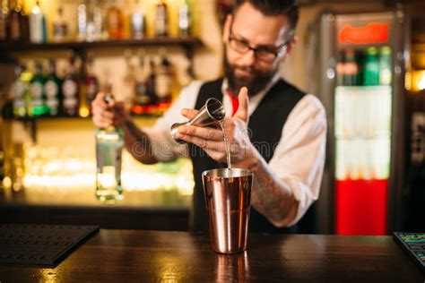 Bartender Pouring Alcohol Beverage In Metal Glass Stock Image Image