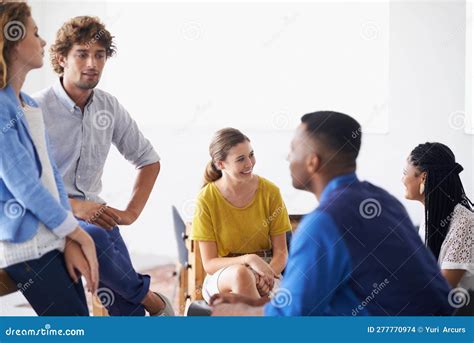 Business Discussions Or A Group Of Young Business People Having A