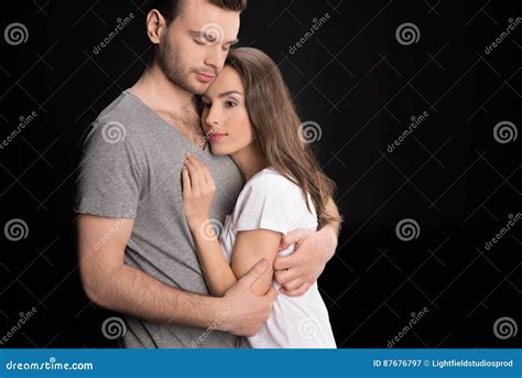 Portrait Of Pensive Woman Bonding To Man And Looking Away Stock Image