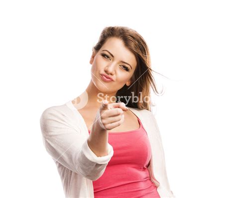 Elegant Woman Pointing To The Camera Isolated On A White Background