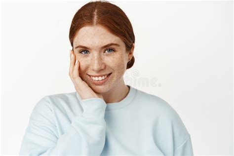 Women Beauty Tender And Feminine Redhead Girl Smiling White Teeth Touching Pale Facial Skin