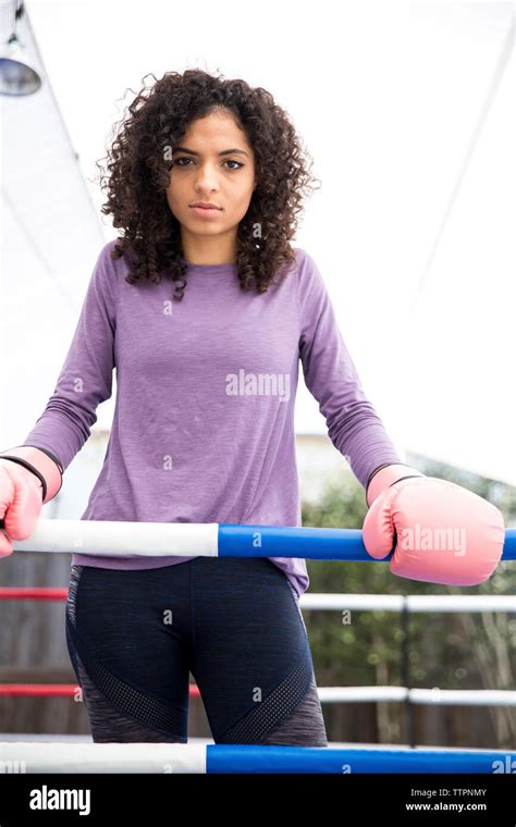 Portrait Of Female Boxer Standing In Boxing Ring Stock Photo Alamy