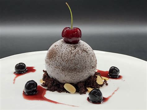 Fold the whipped coconut cream into the mousse then refrigerate the entire mixture until it is firm or until needed. Black Forest Bombe, chocolate cake, cherry ice cream ...