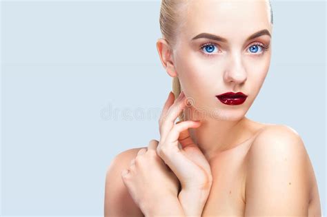 Close Up Portrait Of Blonde Girl With Perfect Skin And Makeup