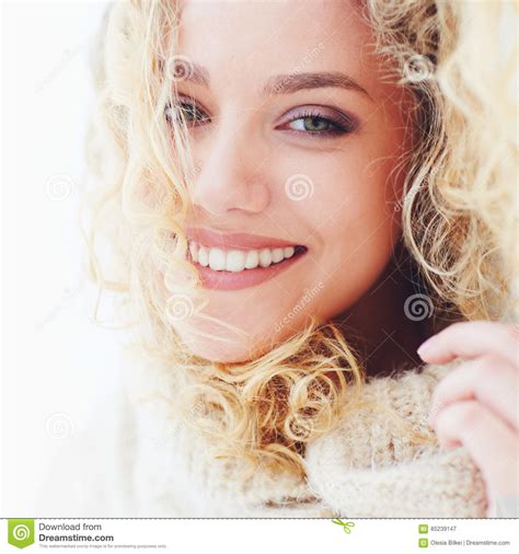 Portrait Of Beautiful Happy Woman With Curly Hair And Adorable Smile