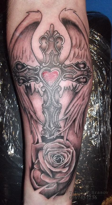 Rose tattoo meanings rose tattoos are one of the most popular tattoo designs for men and women in western civilization. rose and cross tattoo by tattoobrasov on DeviantArt