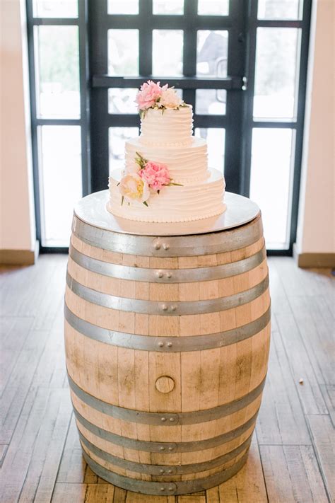 cakes and desserts photos wine barrel wedding cake display inside weddings