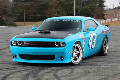 Blue Dodge Challenger Fitted With Aftermarket Side Skirts And Halo