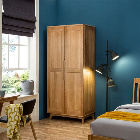 Reflective doors are a great alternative to mirrors especially if you're not comfortable with the peeking in yet want the wardrobe to be just as stylish. New Modern Simple Wooden Clothes Double Doors Wardrobe ...
