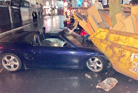 Porsche Smashed To Bits After Crashing Into Skip Swns