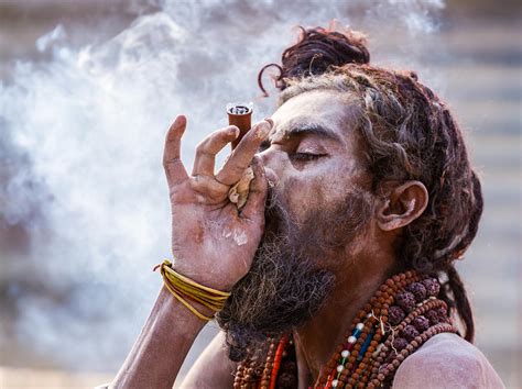 A Hindu Sadhu Smoking A Hash Pipe India Photograph By Nila Newsom
