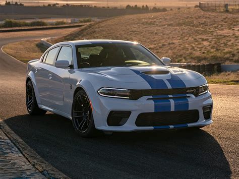 It's not opulent, but it is fast. The 2021 Dodge Charger SRT Hellcat Comes Out From the Shadows