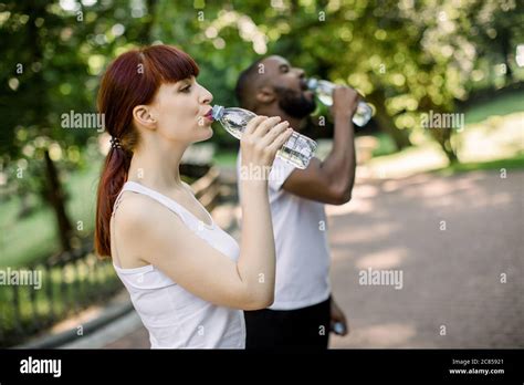 Water Break Sport And Fitness Concept Happy Young Multiethnic Friends
