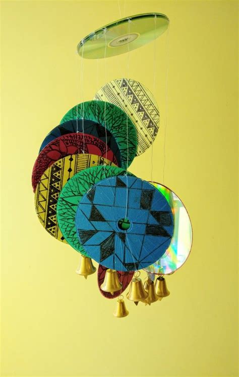 DIY suncatcher windchime from old CDs | Wind chimes, Old cds, Suncatchers