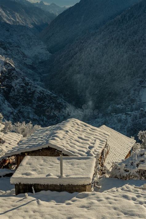 Snow Covered Wooden House In Mountains Majestic Winter Landscape In