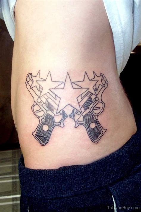 Funky Gun Tattoo On Waist Tattoos Designs