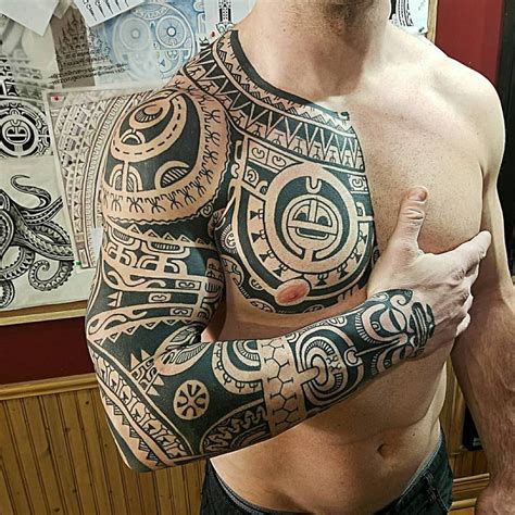 Polynesian Style Full Sleeve And Chest Tattoo