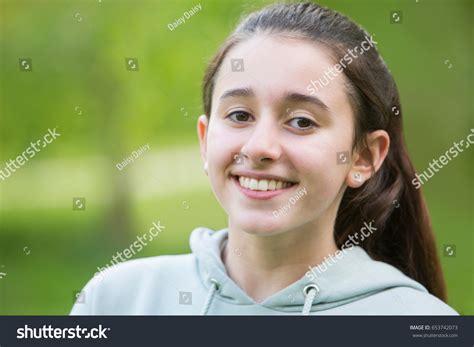 Portrait Smiling Pre Teen Girl Outdoors Stock Photo 653742073